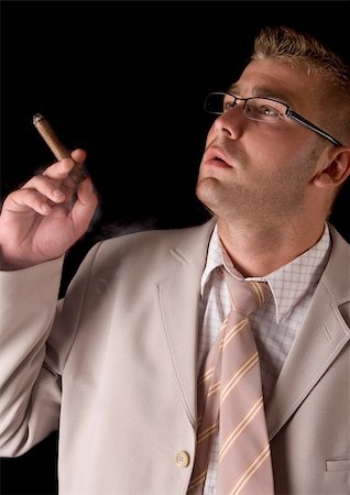 Businessman smoking cigar Stock Photo - Budget Royalty-Free & Subscription, Code: 400-04786993