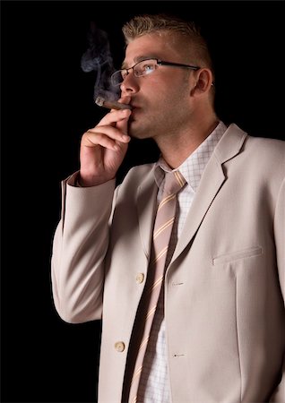 Businessman smoking cigar Stock Photo - Budget Royalty-Free & Subscription, Code: 400-04787000