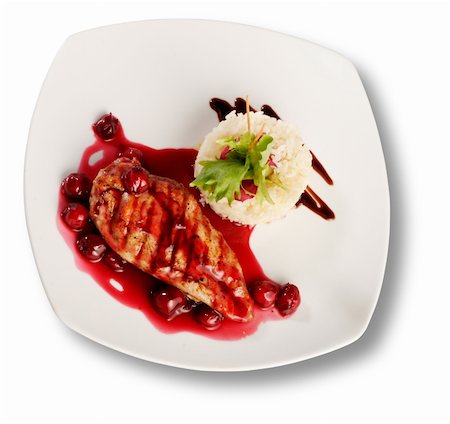 fine food - Delicious beef with cherry sauce. File includes clipping path for easy background removing Stock Photo - Budget Royalty-Free & Subscription, Code: 400-04787524
