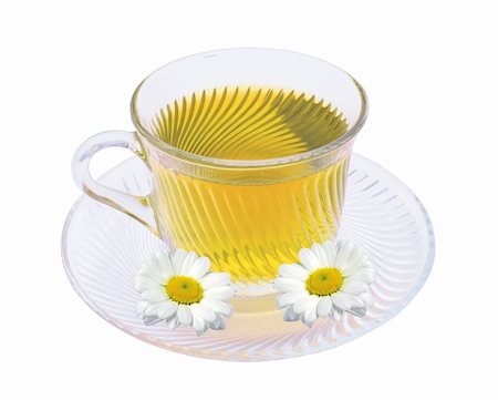 simsearch:600-06180169,k - Herbal chamomile tea in glass cup isolated on white background Foto de stock - Super Valor sin royalties y Suscripción, Código: 400-04787634