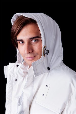 peeping fashion - Portrait of a young man  wearing a white coat with hood , isolated on white. Studio shot Stock Photo - Budget Royalty-Free & Subscription, Code: 400-04787839