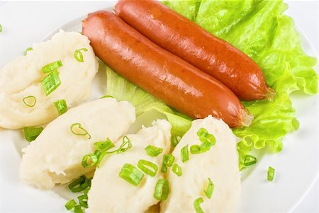 simsearch:400-04848063,k - Cutlets from potato and sausage at green lettuce and green onion Foto de stock - Super Valor sin royalties y Suscripción, Código: 400-04788414