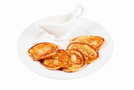 pancake bake - thick pancake with sauce isolated on a white background Stock Photo - Budget Royalty-Free & Subscription, Code: 400-04788415