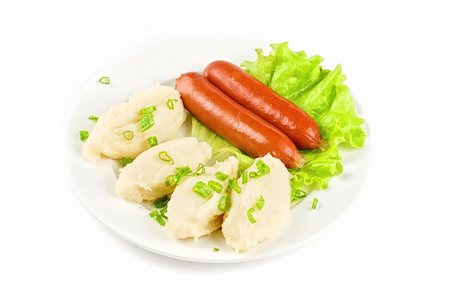 simsearch:400-04573343,k - Cutlets from potato and sausage at green lettuce and green onion Photographie de stock - Aubaine LD & Abonnement, Code: 400-04788413