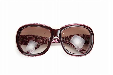 simsearch:400-04855630,k - Modern sunglasses isolated on a white Foto de stock - Royalty-Free Super Valor e Assinatura, Número: 400-04788499