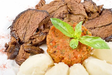 simsearch:400-04855321,k - delicate beef fillet roasted with herbs - thyme, rosemary,clary, with potato and vegetable paste Stock Photo - Budget Royalty-Free & Subscription, Code: 400-04788534