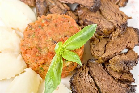 simsearch:400-04855321,k - delicate beef fillet roasted with herbs - thyme, rosemary,clary, with potato and vegetable paste Stock Photo - Budget Royalty-Free & Subscription, Code: 400-04788533