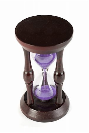 hourglass closeup isolated on a white background Stock Photo - Budget Royalty-Free & Subscription, Code: 400-04788588