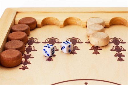 View of dice and game pieces during backgammon game Stock Photo - Budget Royalty-Free & Subscription, Code: 400-04788876