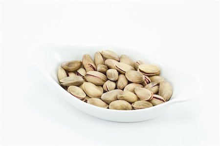 pistachio kernel - pistachio isolated on white Stock Photo - Budget Royalty-Free & Subscription, Code: 400-04789011