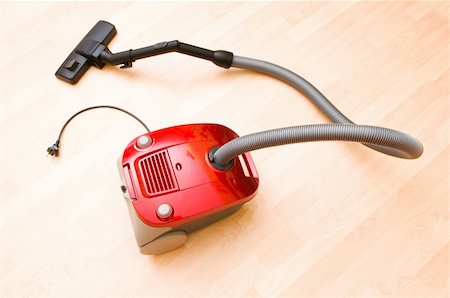 simsearch:400-08257628,k - Vacuum cleaner on the wooden floor Fotografie stock - Microstock e Abbonamento, Codice: 400-04789096