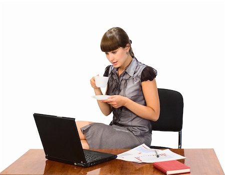 simsearch:400-05732500,k - Businesswoman with cap of coffee and laptop.Isolated on white Foto de stock - Royalty-Free Super Valor e Assinatura, Número: 400-04789133