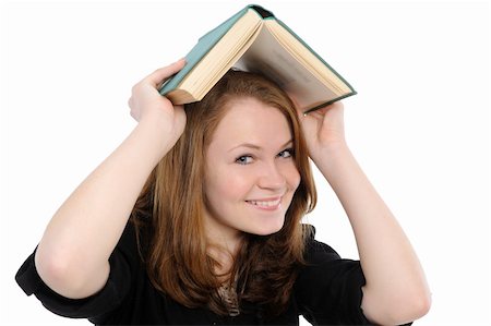 simsearch:400-04829236,k - girl with thick and heavy textbook over her head Stock Photo - Budget Royalty-Free & Subscription, Code: 400-04789447