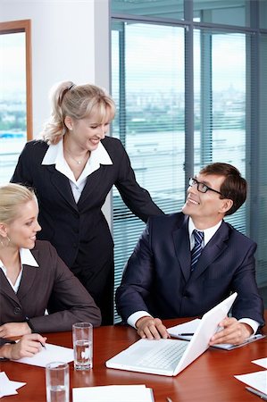 simsearch:400-05669026,k - Three business people in suits in the office Stock Photo - Budget Royalty-Free & Subscription, Code: 400-04789479