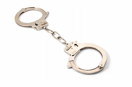 police handcuffs isolated on a white background Stock Photo - Budget Royalty-Free & Subscription, Code: 400-04789928