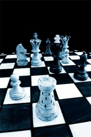 simsearch:400-04811369,k - chess pieces on chess board showing competition success and strategy in business Stock Photo - Budget Royalty-Free & Subscription, Code: 400-04780031