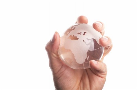 simsearch:400-04776028,k - environmental protection or business concept with glass globe in hand isolated on white Photographie de stock - Aubaine LD & Abonnement, Code: 400-04780135