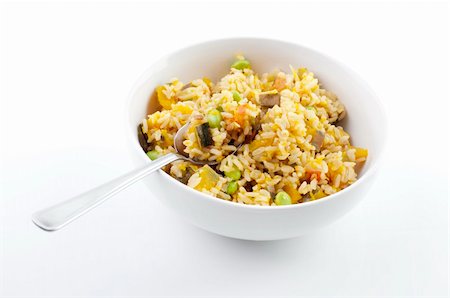 Bowl of pumpkin fried rice on white background Stock Photo - Budget Royalty-Free & Subscription, Code: 400-04780472