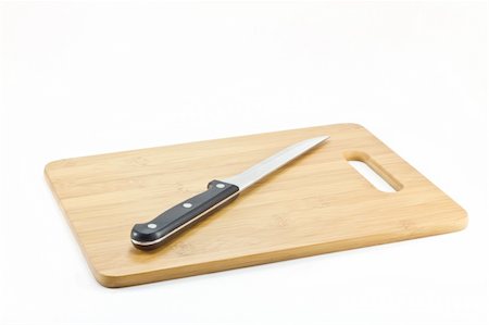Cutting board isolated on white Stock Photo - Budget Royalty-Free & Subscription, Code: 400-04780677