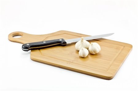 Cutting board isolated on white Stock Photo - Budget Royalty-Free & Subscription, Code: 400-04780682