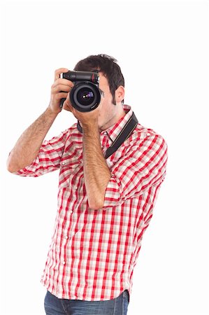 shooting the head with the hand - Young Man Photographer Taking Photos Stock Photo - Budget Royalty-Free & Subscription, Code: 400-04780711