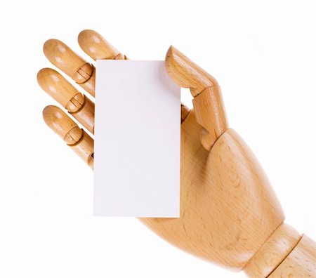 simsearch:400-06137807,k - Wooden hand with white card isolated on a white background Foto de stock - Super Valor sin royalties y Suscripción, Código: 400-04781205