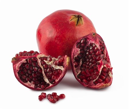 simsearch:400-05196174,k - Fresh full and opened pomegranate on white background Photographie de stock - Aubaine LD & Abonnement, Code: 400-04781391