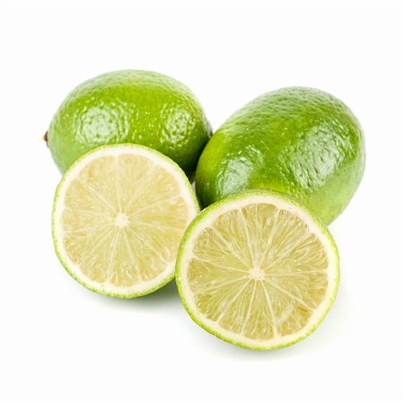simsearch:400-08814206,k - ripe lime isolated on a white background Photographie de stock - Aubaine LD & Abonnement, Code: 400-04781695
