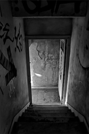 simsearch:700-00403994,k - Stairs and exit door of abandoned house. Black and white. Stock Photo - Budget Royalty-Free & Subscription, Code: 400-04782195