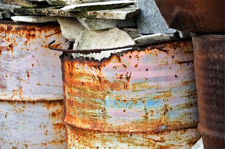 simsearch:600-06007915,k - Rusty metal barrels filled with rocks. Abstract background. Stock Photo - Budget Royalty-Free & Subscription, Code: 400-04782205