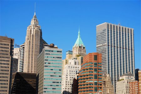 simsearch:400-04782234,k - New York City Manhattan skyline with historic office skyscrapers at sunset Stockbilder - Microstock & Abonnement, Bildnummer: 400-04782213