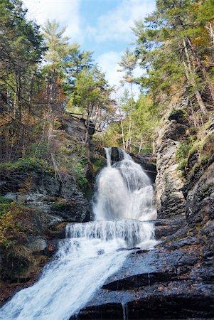 Waterfall in Autumn mountain with woods, foliage and rocks. From Digmans Fall of Pennsylvania Stock Photo - Budget Royalty-Free & Subscription, Code: 400-04782228