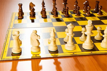 simsearch:640-01350185,k - Set of chess figures on the playing board Photographie de stock - Aubaine LD & Abonnement, Code: 400-04782300