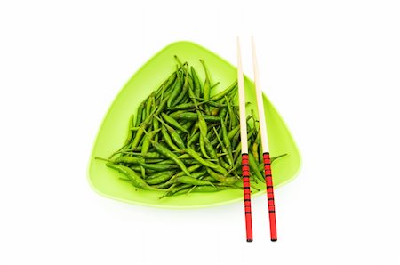 simsearch:400-04288181,k - Hot peppers with chopsticks and plate Photographie de stock - Aubaine LD & Abonnement, Code: 400-04782318