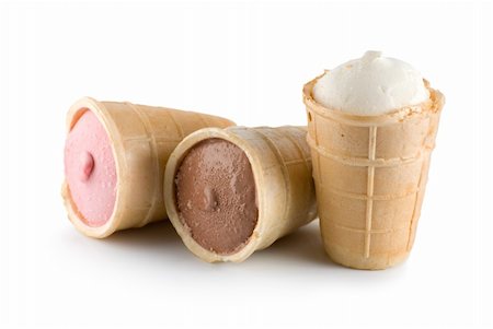 Three different flavors of ice cream cones... chocolate, vanilla, and strawberry Stock Photo - Budget Royalty-Free & Subscription, Code: 400-04783057