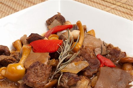 simmering - Homemade beef stew with mushrooms, traditional goulash Stock Photo - Budget Royalty-Free & Subscription, Code: 400-04783069