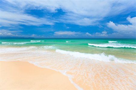 simsearch:400-04783475,k - Beautiful sandy tropical beach in sunny day Foto de stock - Royalty-Free Super Valor e Assinatura, Número: 400-04783468
