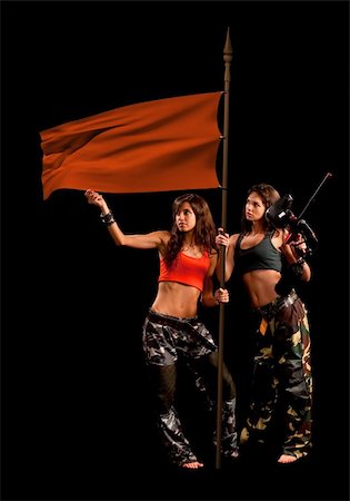 Image of a two paintball players holding their flag Stock Photo - Budget Royalty-Free & Subscription, Code: 400-04783858
