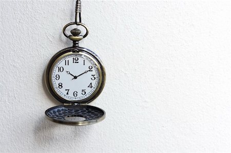 pocket watch - Pocket watch Antique pocket watch on white with soft shadow. Foto de stock - Super Valor sin royalties y Suscripción, Código: 400-04783879