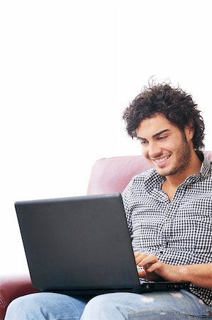 a young man  using laptop, happiness and amazement Stock Photo - Budget Royalty-Free & Subscription, Code: 400-04783888