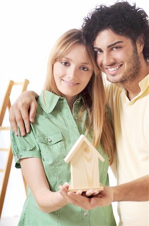 young couple purchase new home, smile and look in camera Stock Photo - Budget Royalty-Free & Subscription, Code: 400-04783881