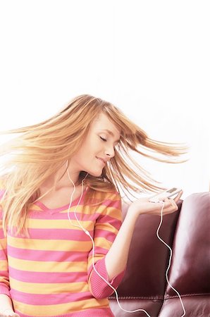woman listen to the music; smiling and relax Stock Photo - Budget Royalty-Free & Subscription, Code: 400-04783914
