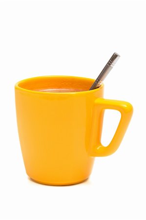 simsearch:400-03971684,k - Yellow mug from coffee on a white background Fotografie stock - Microstock e Abbonamento, Codice: 400-04794105