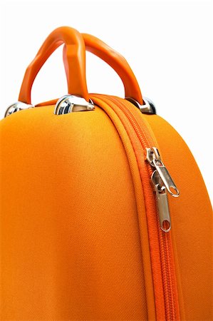 packing fabric - orange large suitcase on a white background Stock Photo - Budget Royalty-Free & Subscription, Code: 400-04794108