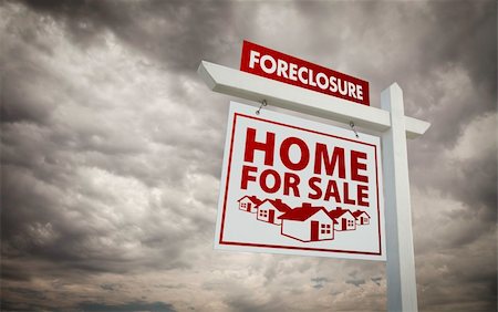 eviction - White Foreclosure Home For Sale Real Estate Sign Over Ominous Cloudy Sky. Stock Photo - Budget Royalty-Free & Subscription, Code: 400-04794779