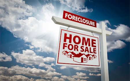 eviction - White Foreclosure Home For Sale Real Estate Sign Over Beautiful Clouds and Blue Sky. Stock Photo - Budget Royalty-Free & Subscription, Code: 400-04794772