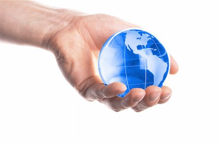 simsearch:400-04776028,k - globe in hand isolated on white showing eco environment or business concept Photographie de stock - Aubaine LD & Abonnement, Code: 400-04794875