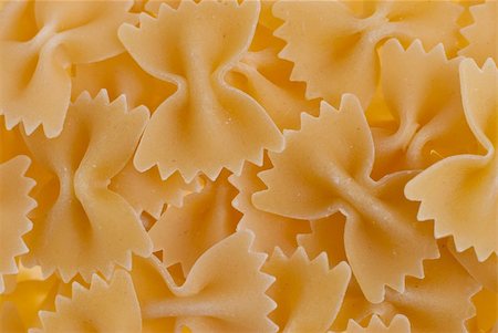 simsearch:400-04341378,k - Macro up view of yellow macaroni background. Fotografie stock - Microstock e Abbonamento, Codice: 400-04795067