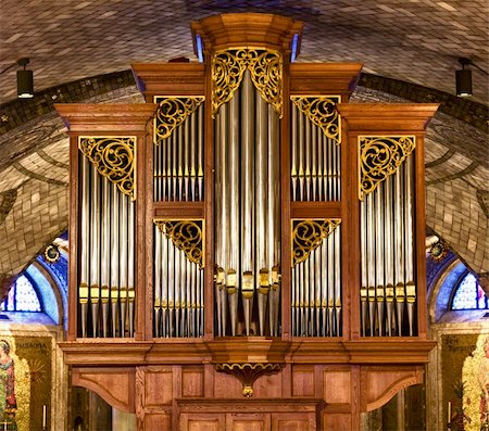 Basilica of the National Shrine of the Immaculate Conception in Washington DC showing interior of Crypt church built in 1920 and focusing on the organ and pipes Foto de stock - Super Valor sin royalties y Suscripción, Código: 400-04795509
