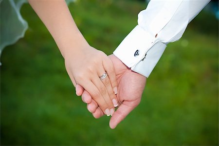 Married couple holding hands Stock Photo - Budget Royalty-Free & Subscription, Code: 400-04795730